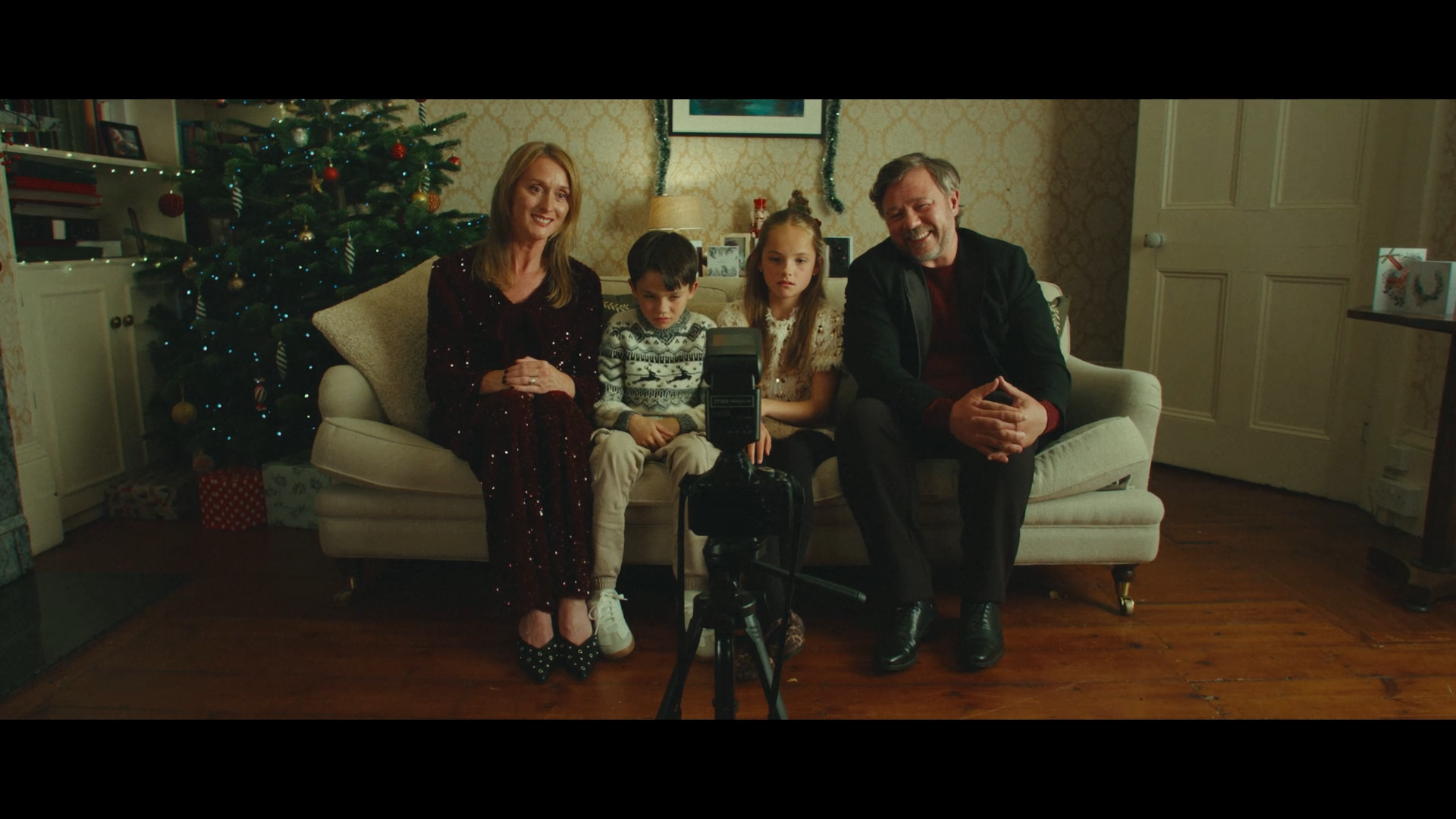 Still from "That's What Makes It Christmas - Family Photo"
