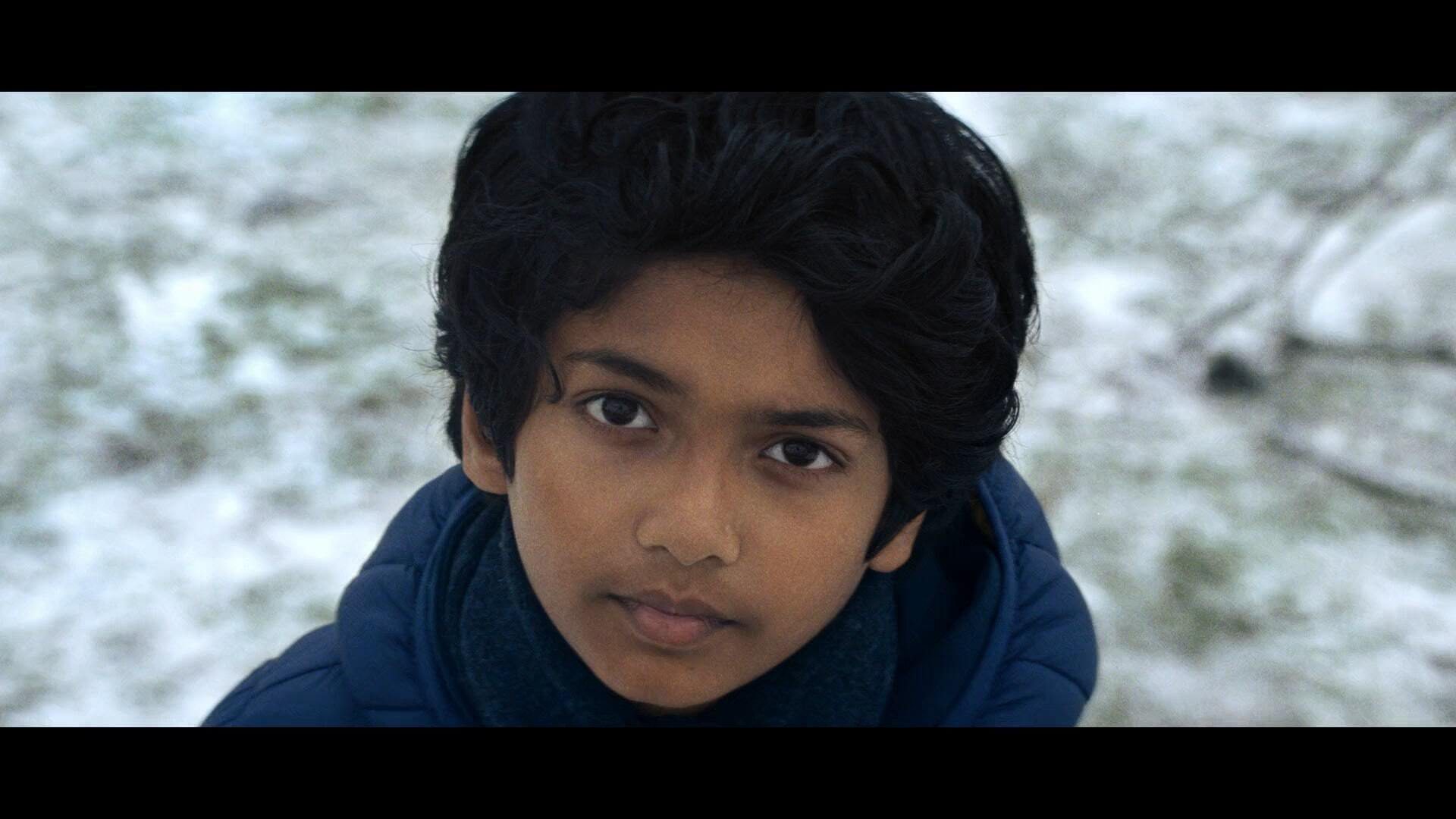 Still from "Give a Little Love"