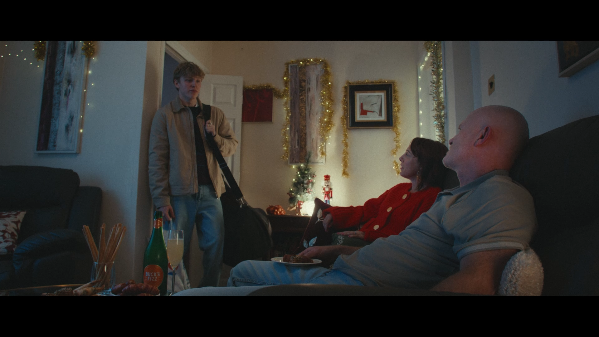 Still from "That's What Makes It Christmas - Queens English"